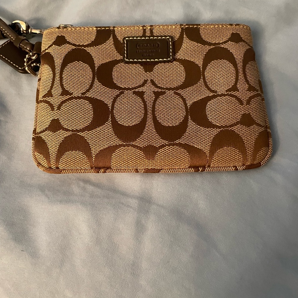Coach small wristlet in excellent condition.